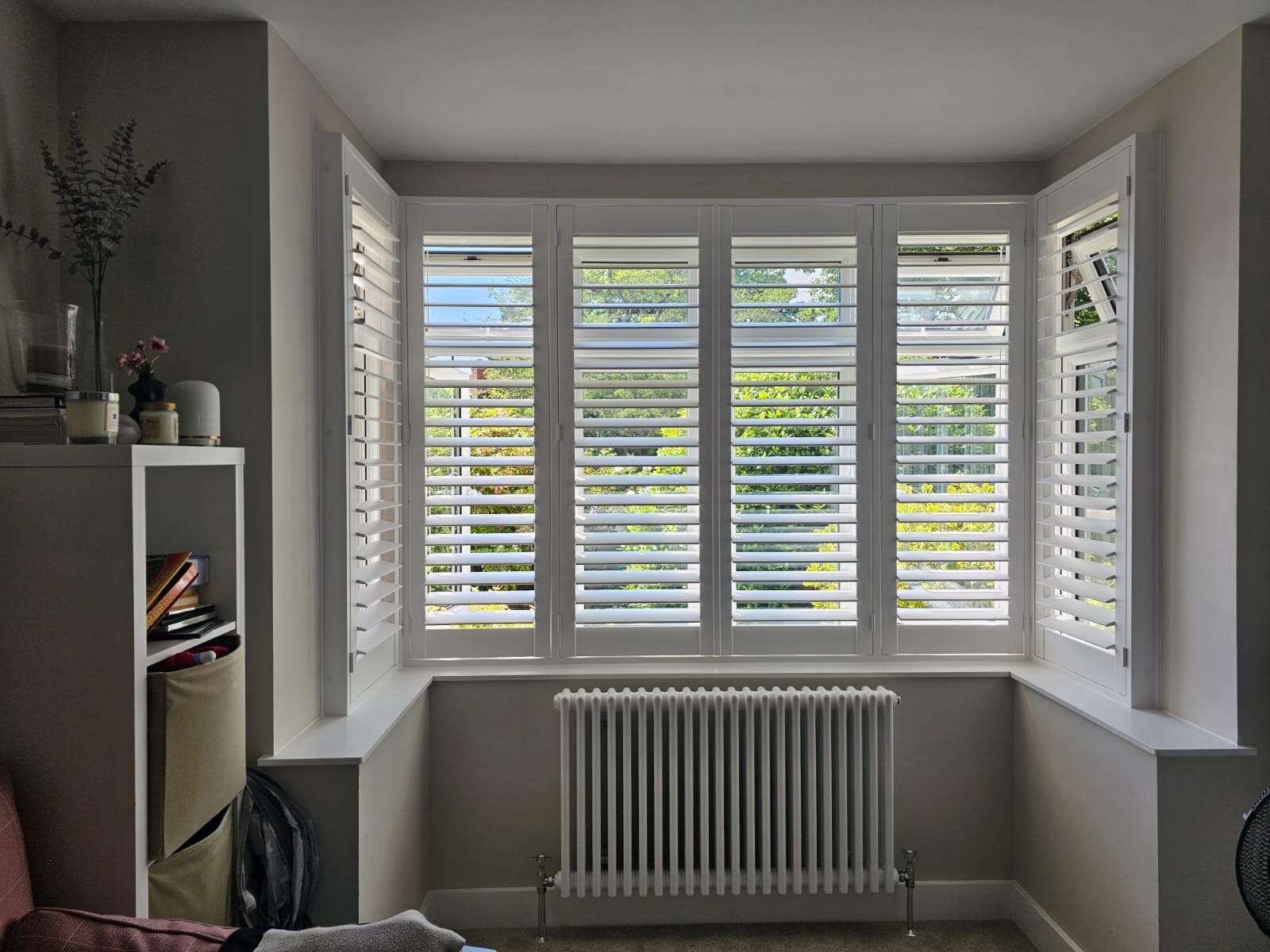 Expert Shutters installer preparing shutters for a kitchen installation
